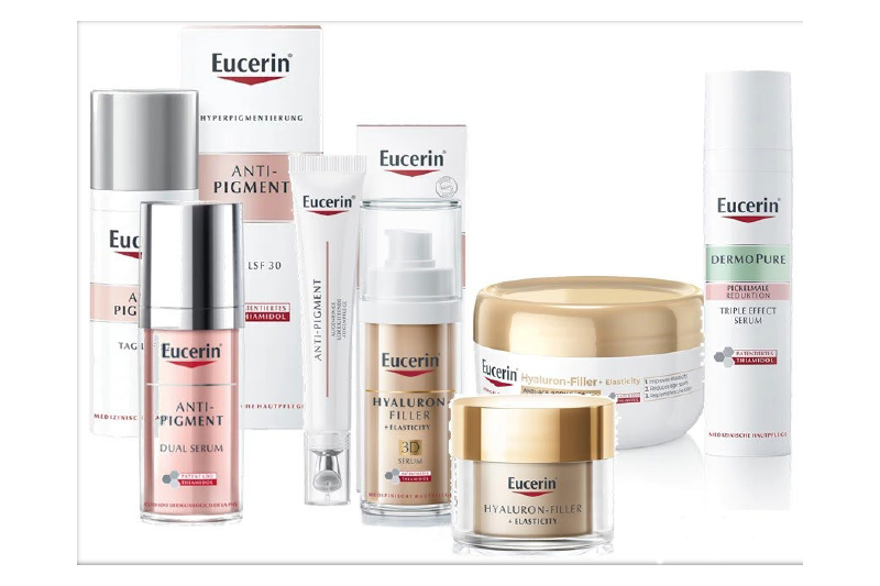 Verschiedene Eucerin Hautpflegeprodukte mit verschiedenen Verpackungen, darunter Tuben, Pumpflaschen und Tiegel.
