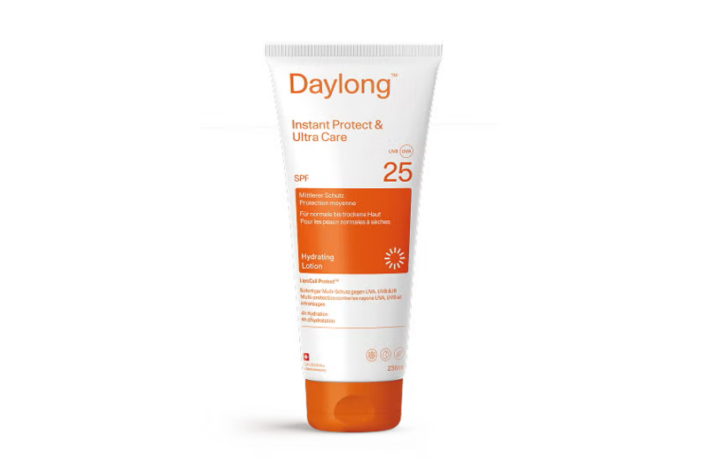 Sonnenschutzcreme in einer weißen Tube mit orangefarbener Schrift, SPF 25, für normale bis trockene Haut.